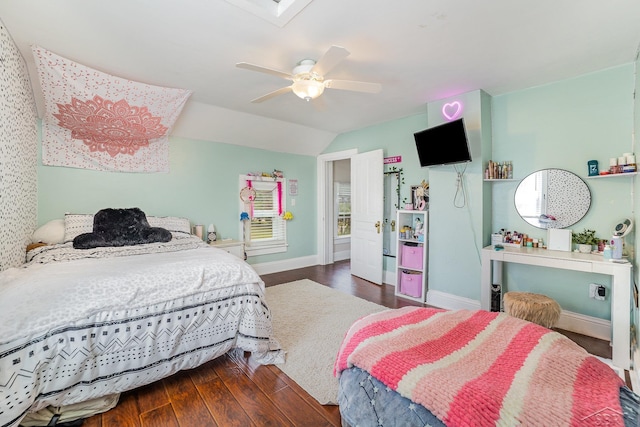 8603 Millington Rd, Vassar, MI 48768 - bedroom featuring wood finished floors, vaulted ceiling, and ceiling fan