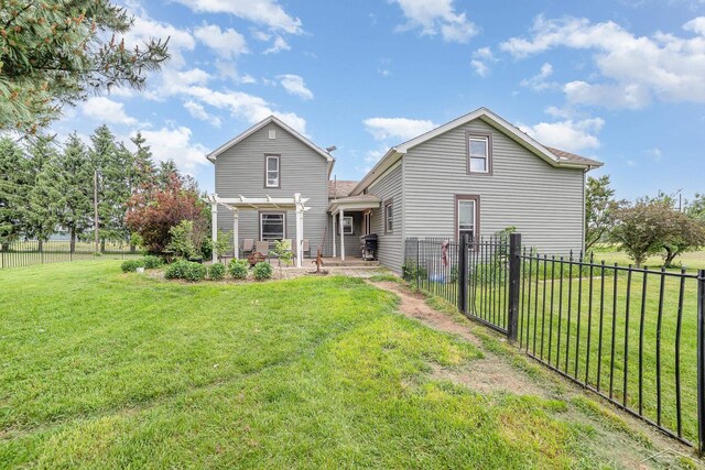 8603 Millington Rd, Vassar, MI 48768 - back of property with a patio and a pergola