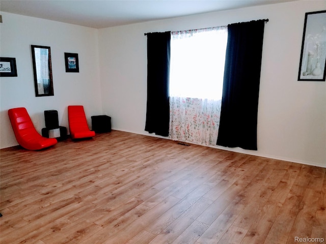 50102 S Benny Ct, New Baltimore, MI 48047 - unfurnished room with light wood-style flooring