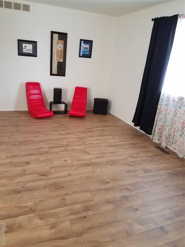 50102 S Benny Ct, New Baltimore, MI 48047 - sitting room featuring light wood-type flooring