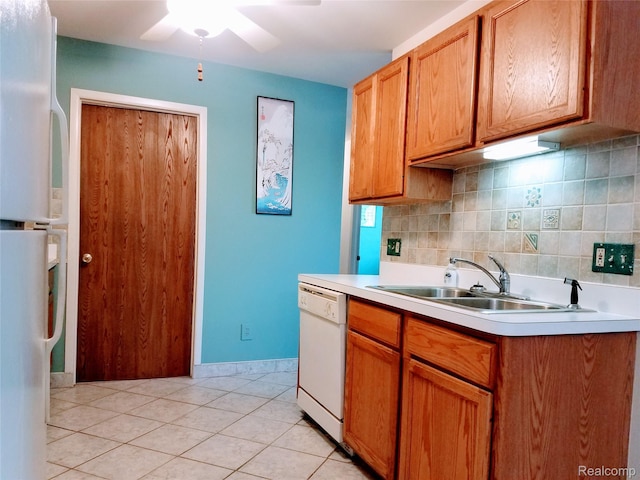 50102 S Benny Ct, New Baltimore, MI 48047 - kitchen with white appliances, a ceiling fan, tasteful backsplash, light countertops, and light tile patterned floors