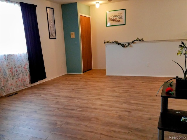 50102 S Benny Ct, New Baltimore, MI 48047 - unfurnished room featuring wood finished floors