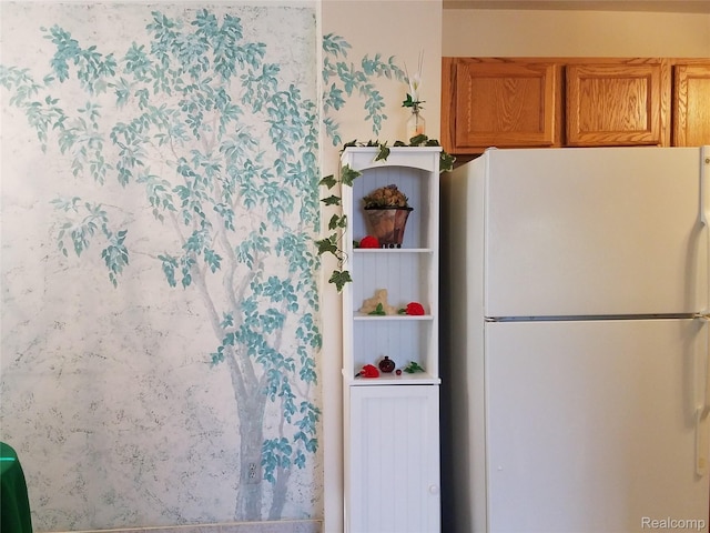 50102 S Benny Ct, New Baltimore, MI 48047 - kitchen with freestanding refrigerator and brown cabinets