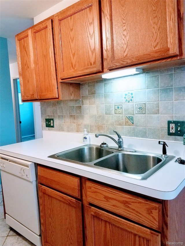 50102 S Benny Ct, New Baltimore, MI 48047 - kitchen with dishwasher, light countertops, backsplash, and brown cabinets
