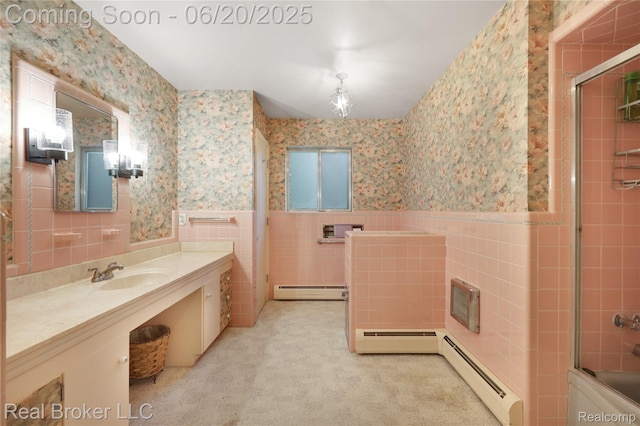 5492 N Sycamore Dr, Burton, MI 48509 - bathroom with wallpapered walls, tile walls, a baseboard radiator, a wainscoted wall, and vanity