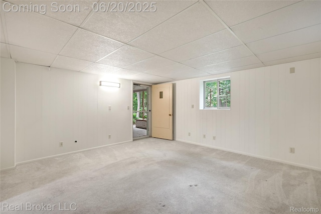 5492 N Sycamore Dr, Burton, MI 48509 - unfurnished room featuring carpet floors and a paneled ceiling
