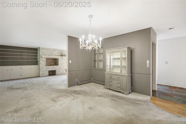 5492 N Sycamore Dr, Burton, MI 48509 - unfurnished dining area with a chandelier, a fireplace, baseboard heating, a wainscoted wall, and carpet floors