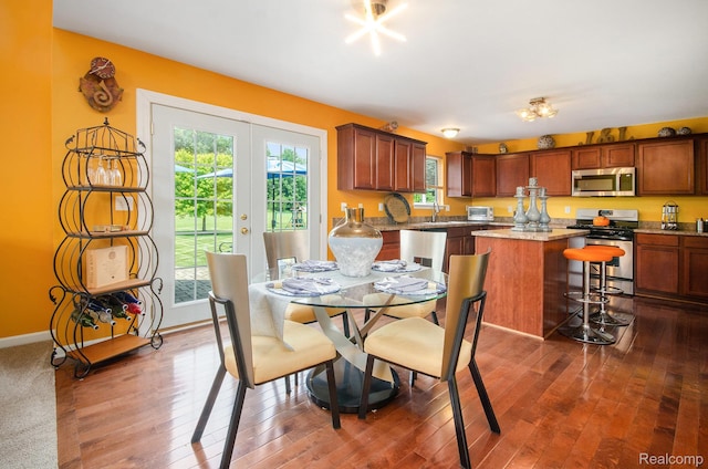 15740 Aspen Dr, Romulus, MI 48174 - dining space with dark wood-type flooring and french doors