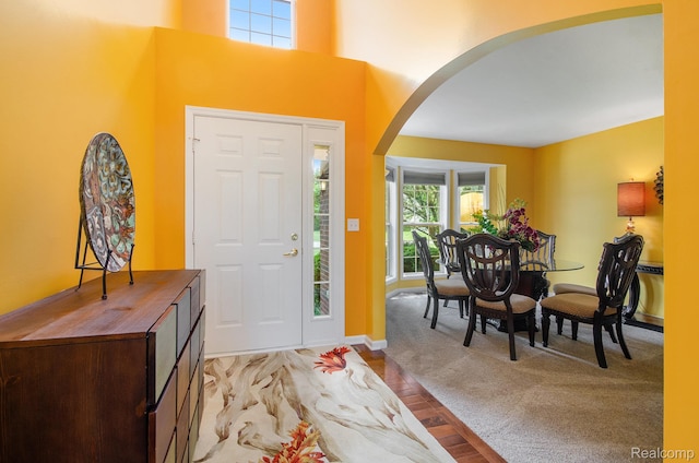 15740 Aspen Dr, Romulus, MI 48174 - foyer entrance featuring arched walkways and light wood-type flooring