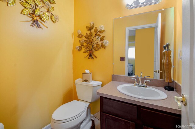 15740 Aspen Dr, Romulus, MI 48174 - bathroom with toilet and vanity