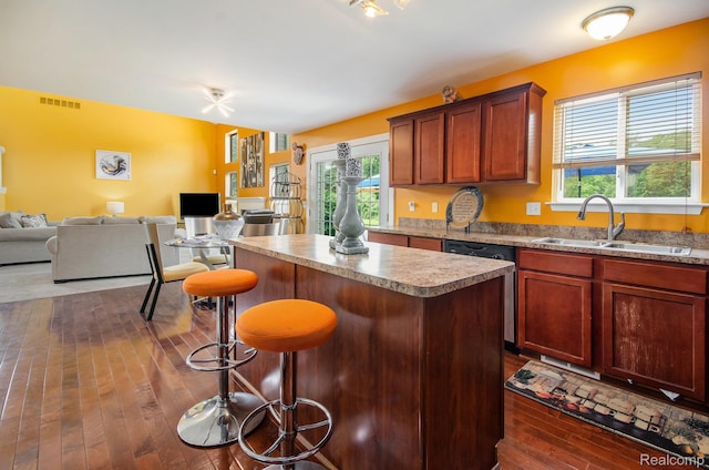 15740 Aspen Dr, Romulus, MI 48174 - kitchen with dishwasher, healthy amount of natural light, open floor plan, and a center island