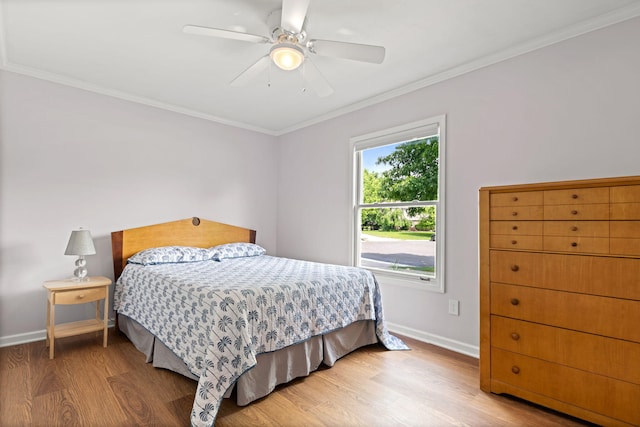 749 Foxboro Ct, Saline, MI 48176 - bedroom featuring light wood-style flooring, crown molding, and a ceiling fan