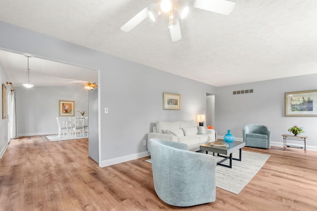 749 Foxboro Ct, Saline, MI 48176 - living area featuring ceiling fan and light wood-type flooring