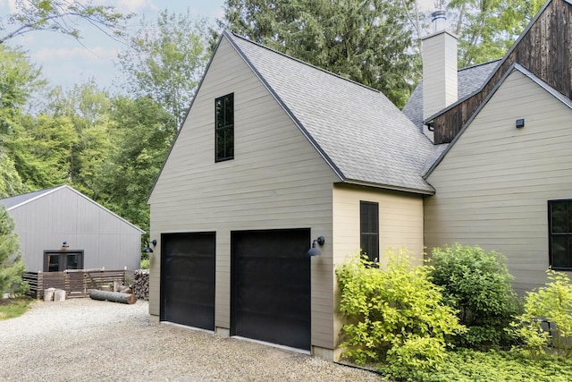 9435 Community Hall Rd, Union Pier, MI 49129 - garage with gravel driveway