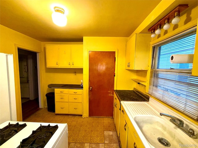 26645 Ross St, Inkster, MI 48141 - kitchen with gas range and white cabinetry