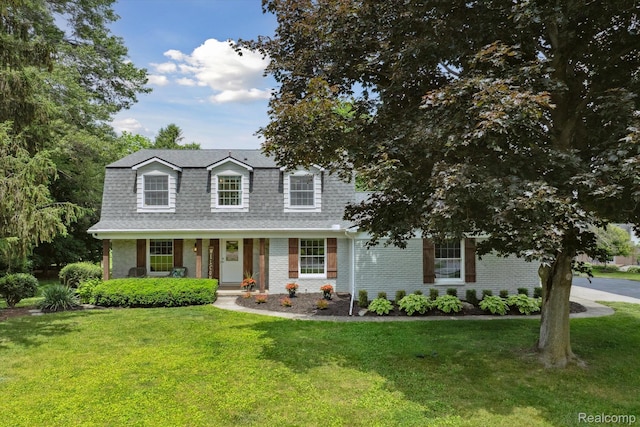 21378 Summerside Ct, Northville, MI 48167 - view of front of property with a shingled roof, a front lawn, and brick siding