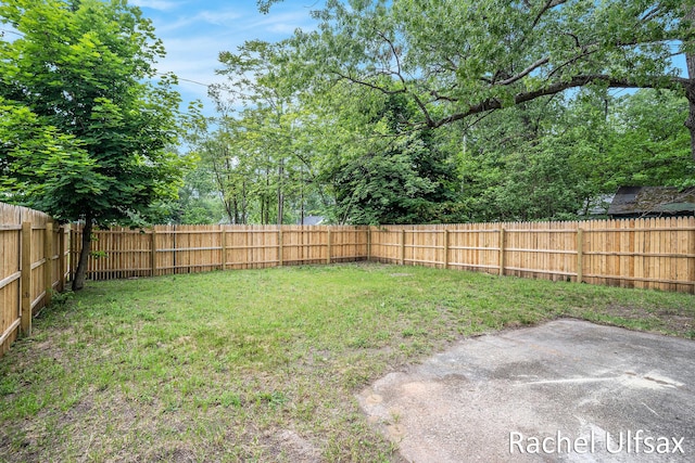 1676 Dyson St, Muskegon, MI 49442 - fenced backyard featuring a patio area