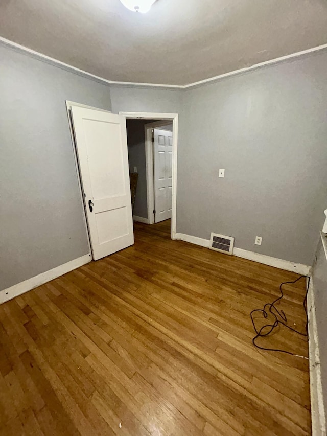 15345 Marlowe St, Detroit, MI 48227 - spare room featuring wood finished floors and baseboards