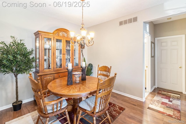 49649 Draper Cir, Plymouth, MI 48170 - dining room with a chandelier and light wood-style flooring
