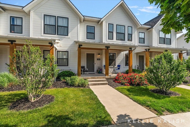 2519 Inverness Rd SE, Grand Rapids, MI 49546 - multi unit property with a porch and a front yard