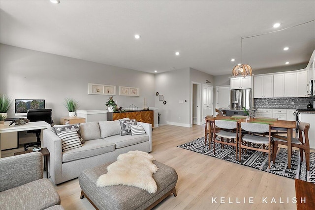 2519 Inverness Rd SE, Grand Rapids, MI 49546 - living area featuring light wood-style floors and recessed lighting