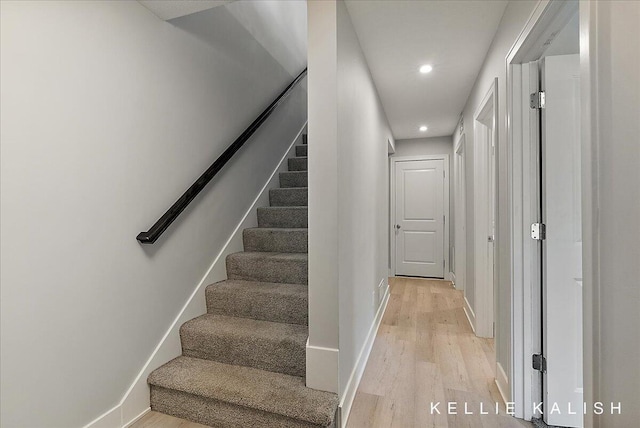2519 Inverness Rd SE, Grand Rapids, MI 49546 - staircase featuring wood finished floors and recessed lighting
