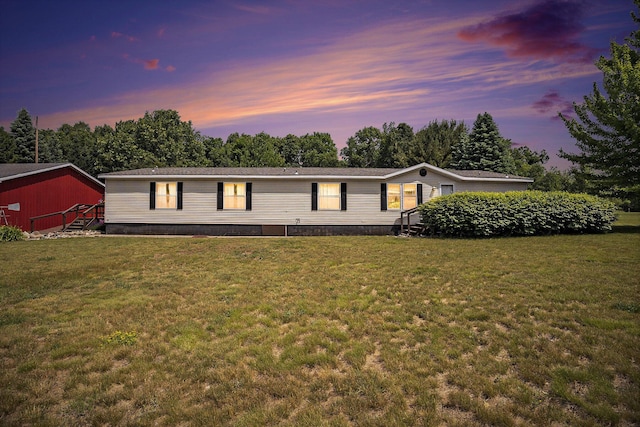 4890 W Birch Ln, Pentwater, MI 49449 - manufactured / mobile home featuring a front lawn