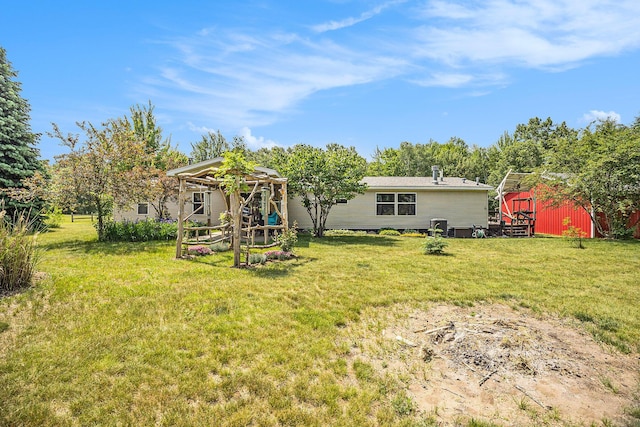 4890 W Birch Ln, Pentwater, MI 49449 - rear view of house featuring a gazebo, a yard, and an outdoor structure