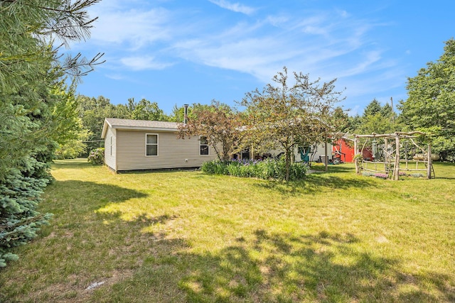 4890 W Birch Ln, Pentwater, MI 49449 - view of green lawn