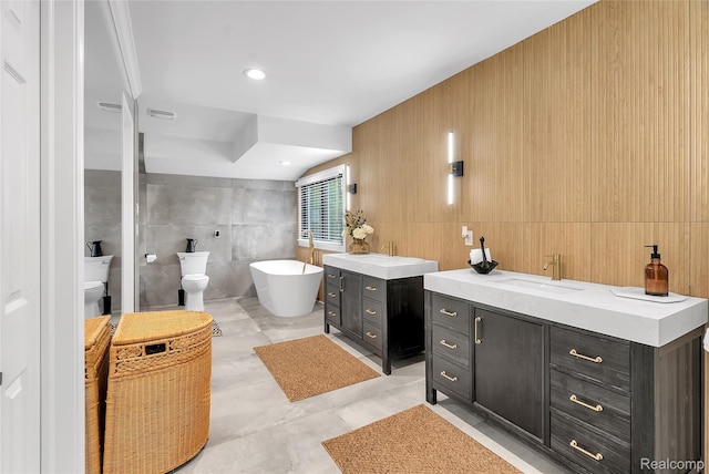 163 Manorwood Dr, Bloomfield Hills, MI 48304 - bathroom with two vanities, tile walls, a freestanding bath, and wood walls