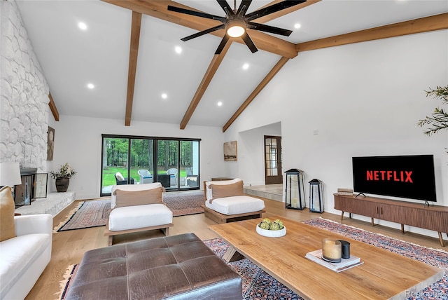 163 Manorwood Dr, Bloomfield Hills, MI 48304 - living area with a fireplace, beam ceiling, high vaulted ceiling, light wood-type flooring, and a ceiling fan