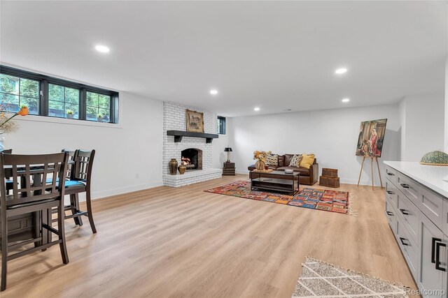 163 Manorwood Dr, Bloomfield Hills, MI 48304 - living area with light wood-type flooring, recessed lighting, and a fireplace