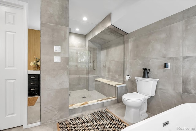 163 Manorwood Dr, Bloomfield Hills, MI 48304 - bathroom with tile walls, tile patterned flooring, a soaking tub, a shower stall, and recessed lighting