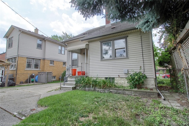 21732 Tenny St, Dearborn, MI 48124 - bungalow-style home with a chimney