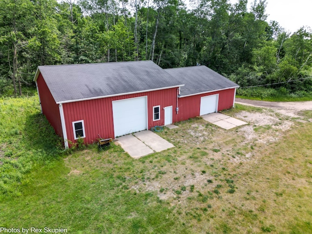 3193 W 112th St, Grant, MI 49327 - view of outbuilding featuring a view of trees and driveway