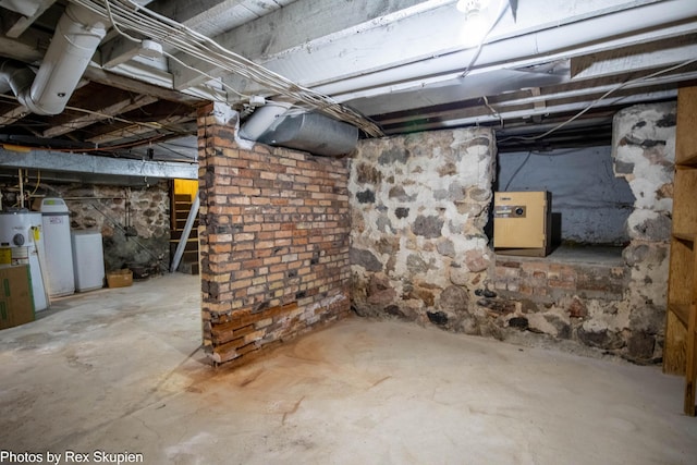 3193 W 112th St, Grant, MI 49327 - unfinished basement featuring electric water heater and a water softener
