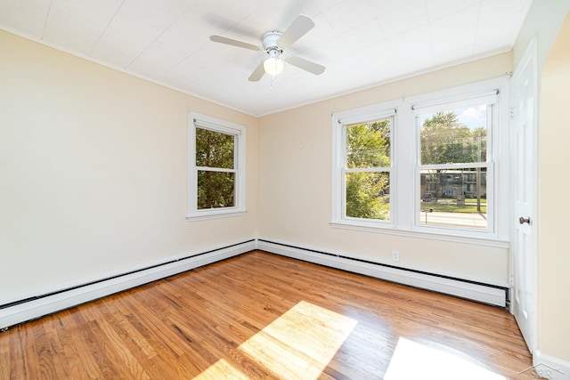 395 S Center Rd, Saginaw, MI 48638 - empty room featuring plenty of natural light, baseboard heating, light wood finished floors, ceiling fan, and ornamental molding