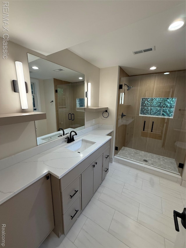 1420 Pettibone Lake Rd, Highland, MI 48356 - full bath with vanity, a shower stall, recessed lighting, and marble finish flooring