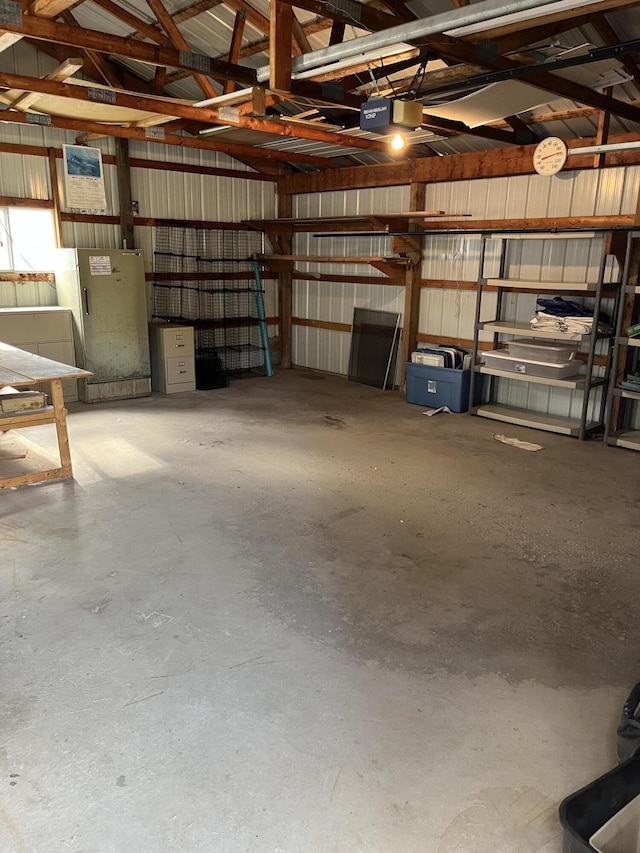 6121 N Pine Ave, White Cloud, MI 49349 - garage with a garage door opener