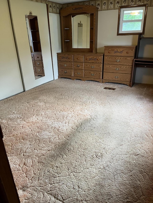 6121 N Pine Ave, White Cloud, MI 49349 - empty room with carpet floors