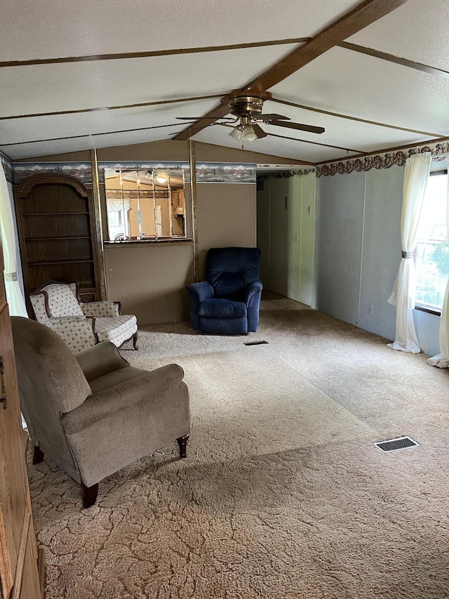 6121 N Pine Ave, White Cloud, MI 49349 - living room with ceiling fan and carpet
