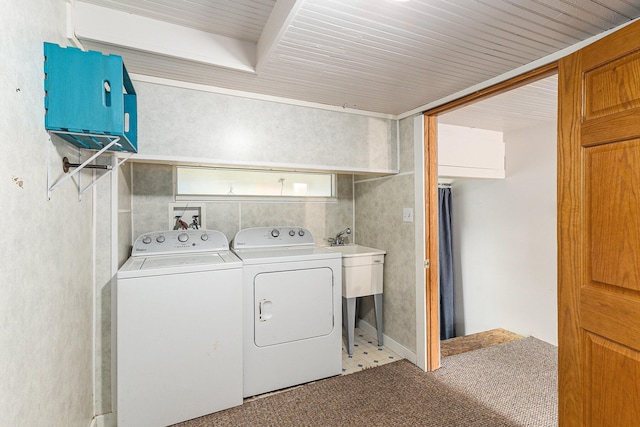 101 E Whittier St, Ludington, MI 49431 - laundry room featuring washing machine and dryer and carpet flooring