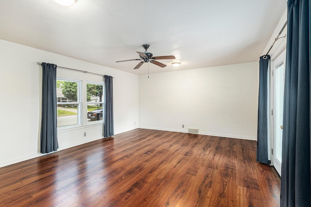 101 E Whittier St, Ludington, MI 49431 - spare room featuring ceiling fan and wood finished floors