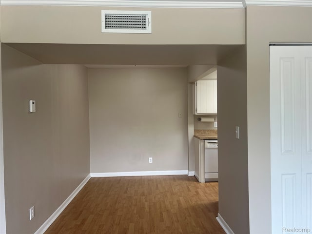 3901 Fort St Unit 202, Riverview, MI 48183 - hallway with wood finished floors and baseboards
