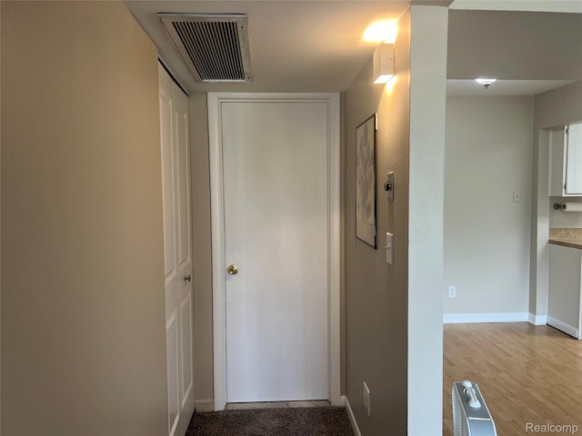 3901 Fort St Unit 202, Riverview, MI 48183 - hall with baseboards and wood finished floors