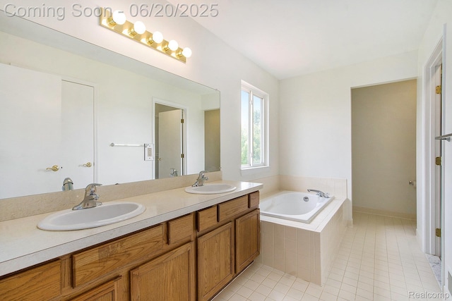 3244 Buckhorn Ct, Ann Arbor, MI 48105 - bathroom featuring double vanity, a bath, and tile patterned flooring