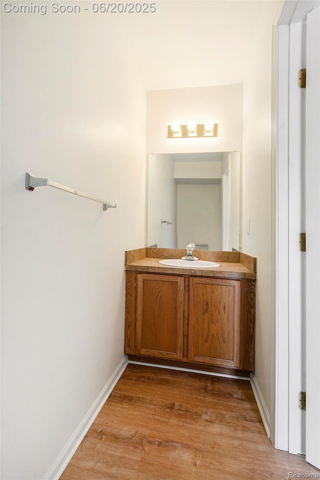 3244 Buckhorn Ct, Ann Arbor, MI 48105 - bathroom with vanity and wood finished floors