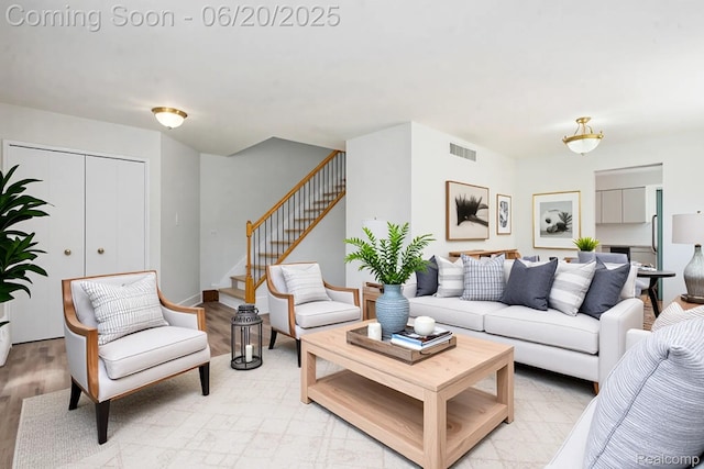 3244 Buckhorn Ct, Ann Arbor, MI 48105 - living area featuring stairway and light wood-style flooring