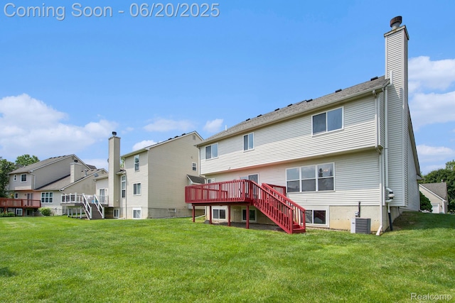 3244 Buckhorn Ct, Ann Arbor, MI 48105 - back of house with stairs, a wooden deck, a chimney, and a lawn