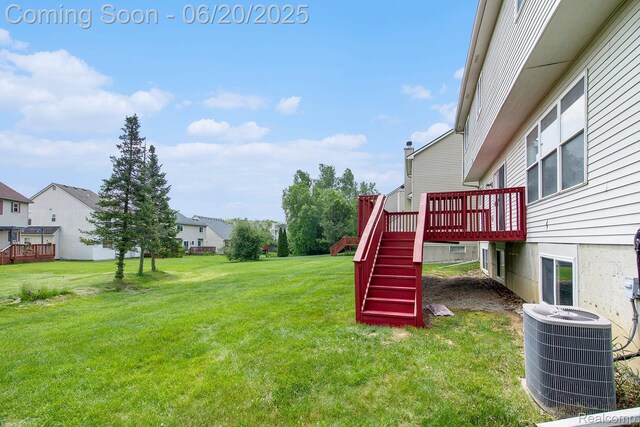 3244 Buckhorn Ct, Ann Arbor, MI 48105 - view of grassy yard featuring a wooden deck, stairway, and a residential view